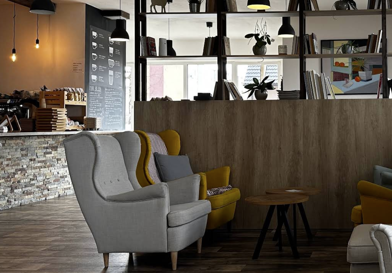 Interior view of a cozy cafe with warm lighting